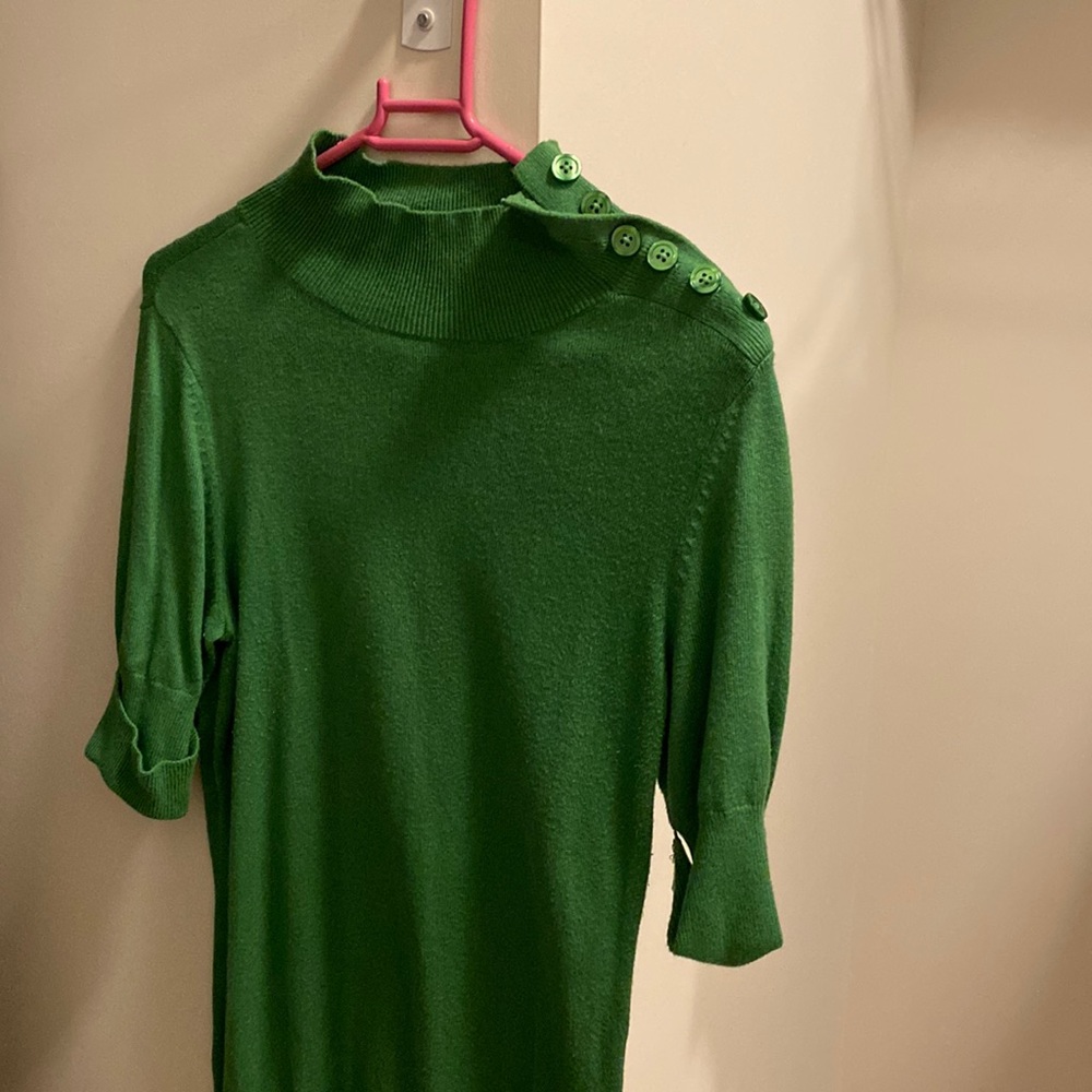 Super flattering in color knot top. My colleagues are tired of seeing me in!